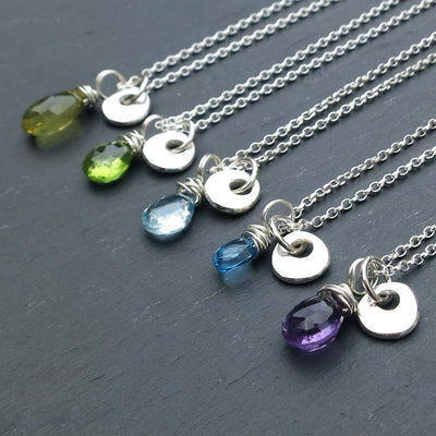 Pebble pendants from the Koh Lipe collection featuring real gemstones