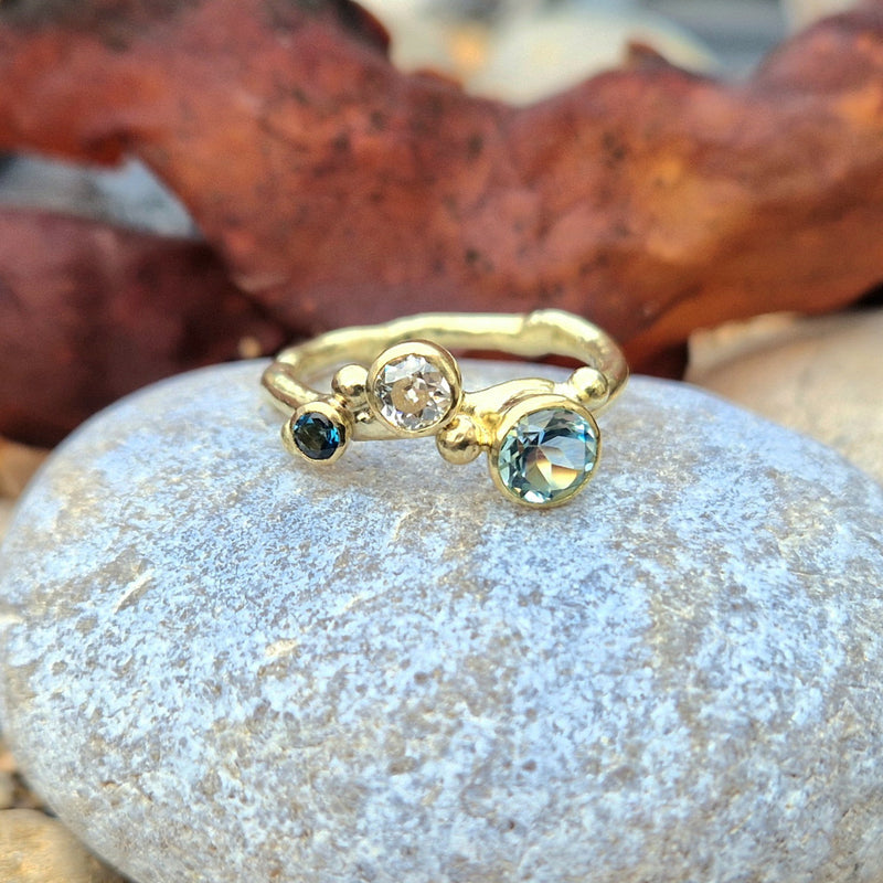 18ct Yellow gold & 6mm sky blue topaz, 4mm diamond & 3mm London blue topaz, 2024