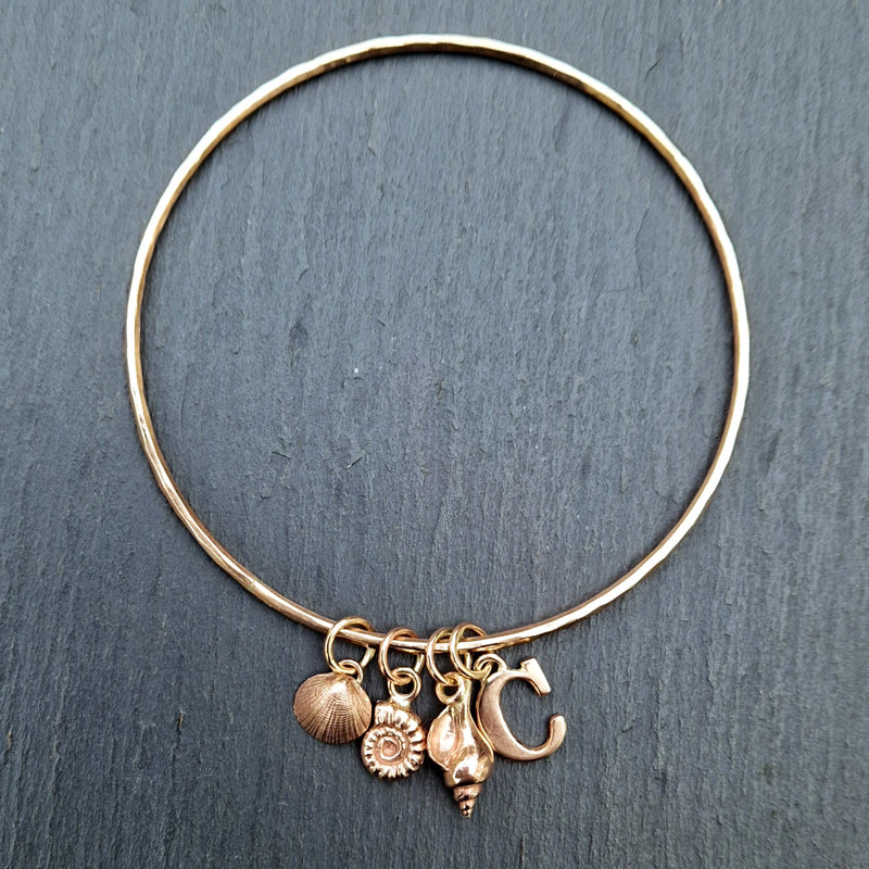 9ct rose gold charm bangle, 2025