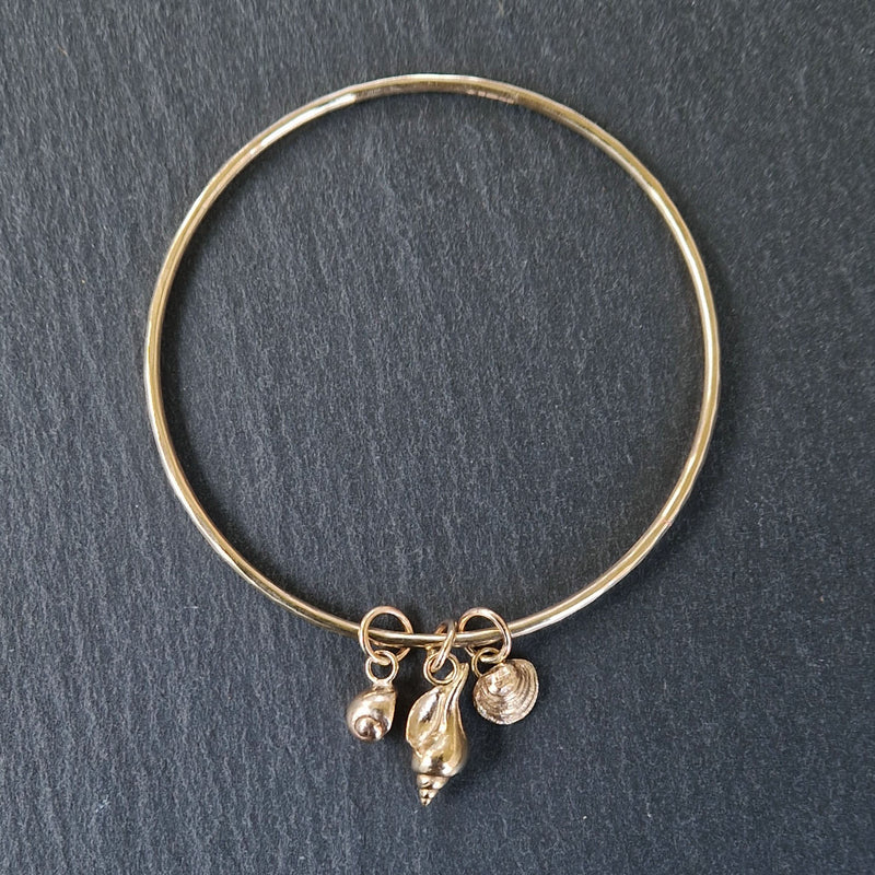9ct Yellow gold rock pool bangle, 2022