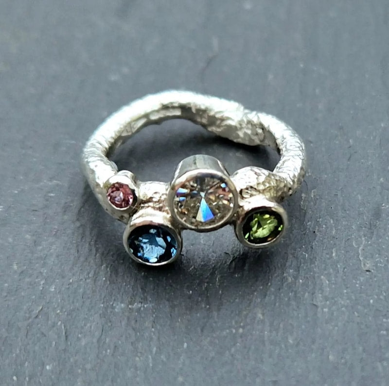 Silver ring with 4 stones: pink tourmaline, London blue topaz, diamond, green tourmaline, 2024