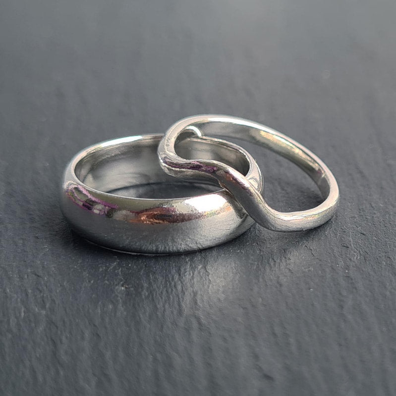 Silver, 6mm & 2mm D-shaped, smooth finish, 2mm band shaped to fit around engagement ring