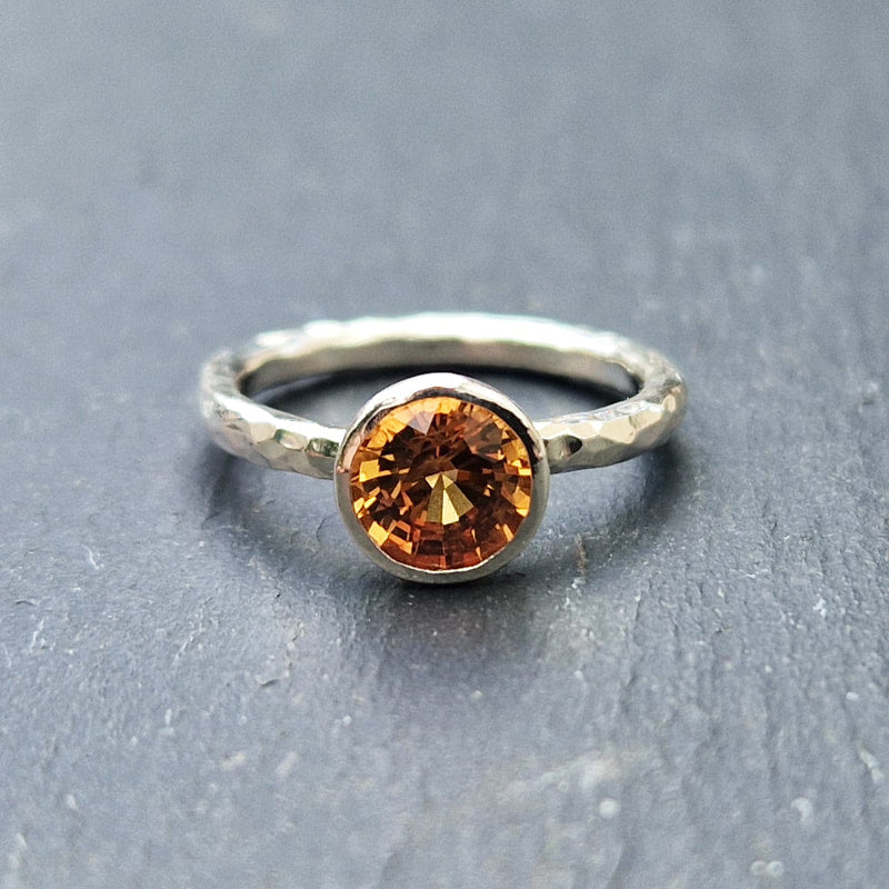 2mm Silver beaten halo and 6mm orange sapphire ring, 2024