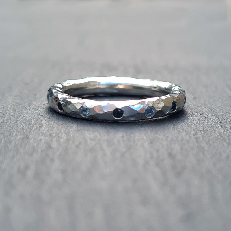 Silver and blue topaz eternity ring, 2022