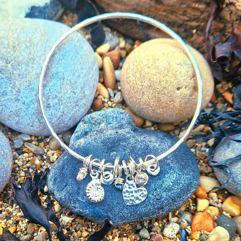 Silver and peach morganite bespoke rock pool bangle, 2025