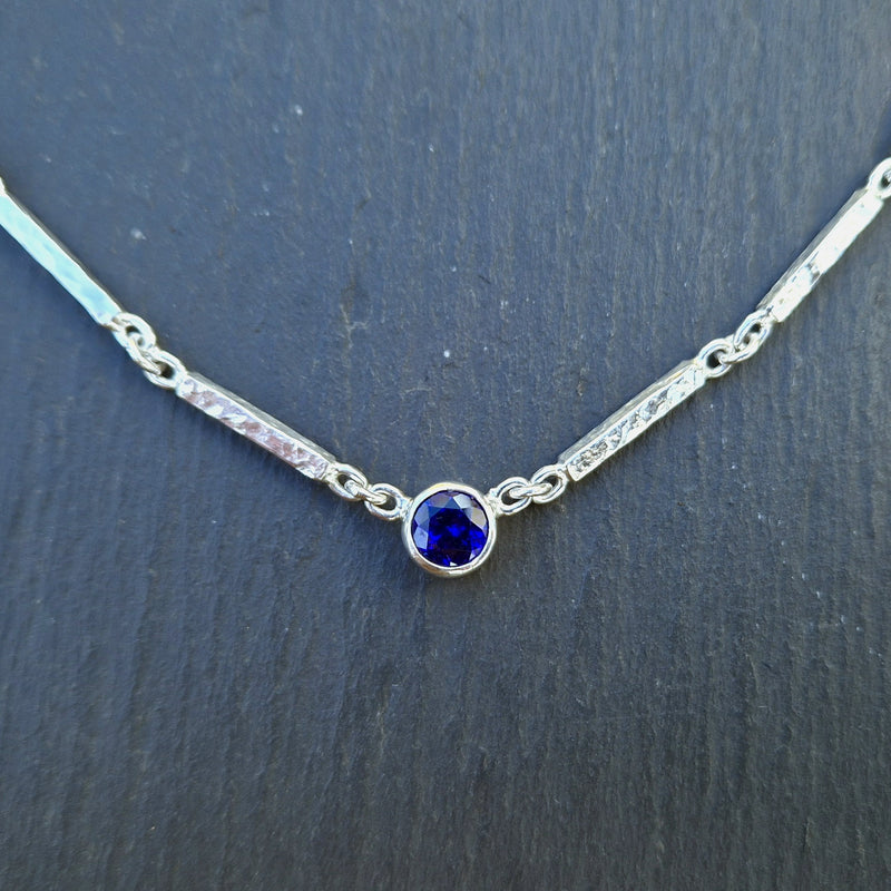 silver and tanzanite erosion bar necklace, 2025