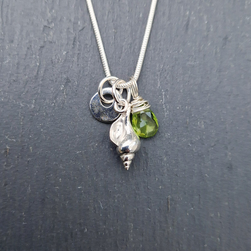Silver conch shell, pebble bead & wired peridot, 2023