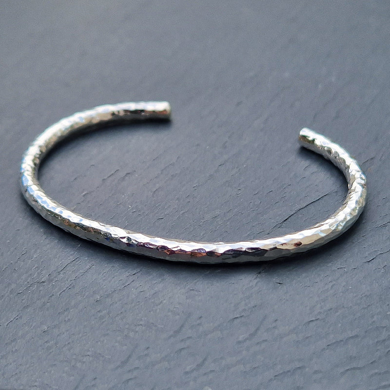Silver beaten halo torque bangle, 2023