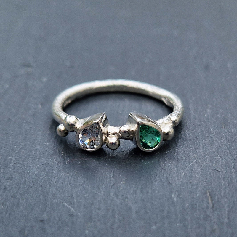 Silver, white sapphire and emerald ring, 2022